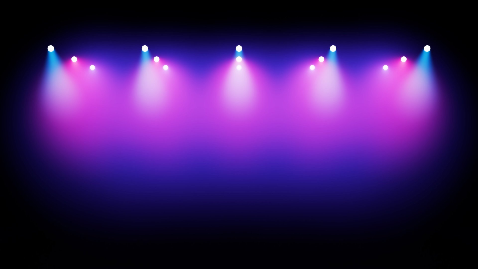Dramatic stage spotlights in blue and pink